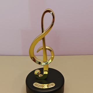 Musical Notes Wind-Up Music Box – Golden Rotating Melody Showpiece for Music Lovers