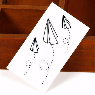 paper plane tattoo