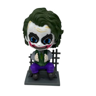 Joker Chibi Collectible Figure Sitting on Bench Clapping