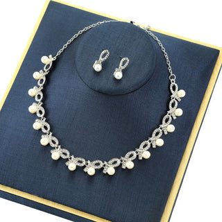The Twisted Tale Necklace | Alluring Rhinestone and Pearls Set