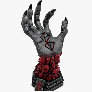 A Berserk collectible figurine _side View