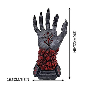 A Berserk collectible figurine Size