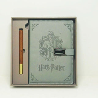 Harry Potter Hufflepuff notebook with pen in a box on a white background