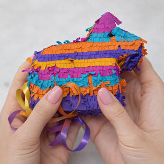 Mini Kisses Surprise Pinata in Hands for Size Reference